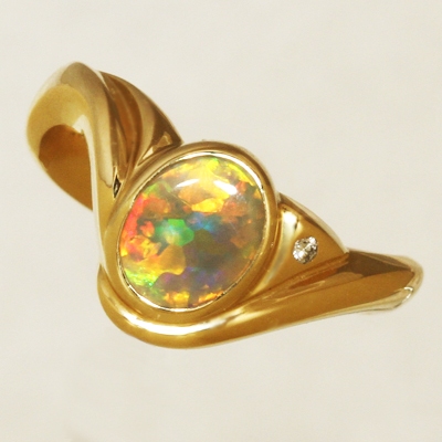 CUSTOM MADE 18k Yellow Gold Ring with a diamond and a SEMI BLACK OPAL Very rare and perfect Hexagonal Harlequin pattern
